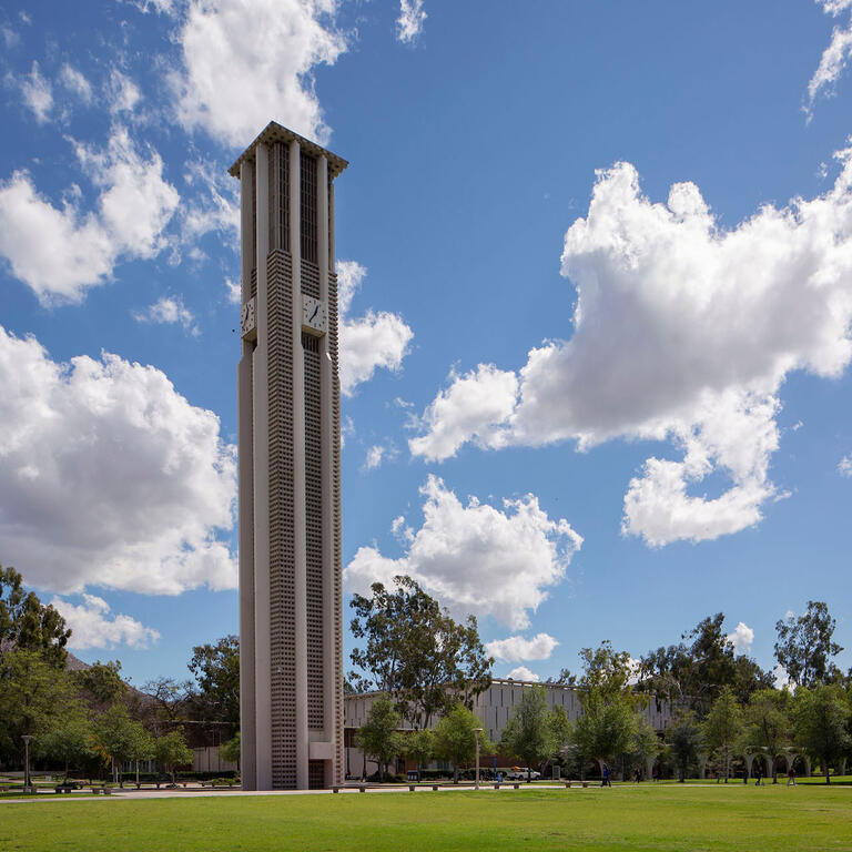 UCR Bell Tower and fluffy white clouds